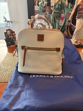Dooney & Bourke Cream Pebbled Leather Backpack with Tan Accents